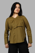 Woman wearing a fullblank branded olive shirt called MIDNIGHT MUSE-A with a plain background