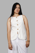Woman wearing a fullblank branded white vest called ZENA-A with a plain background
